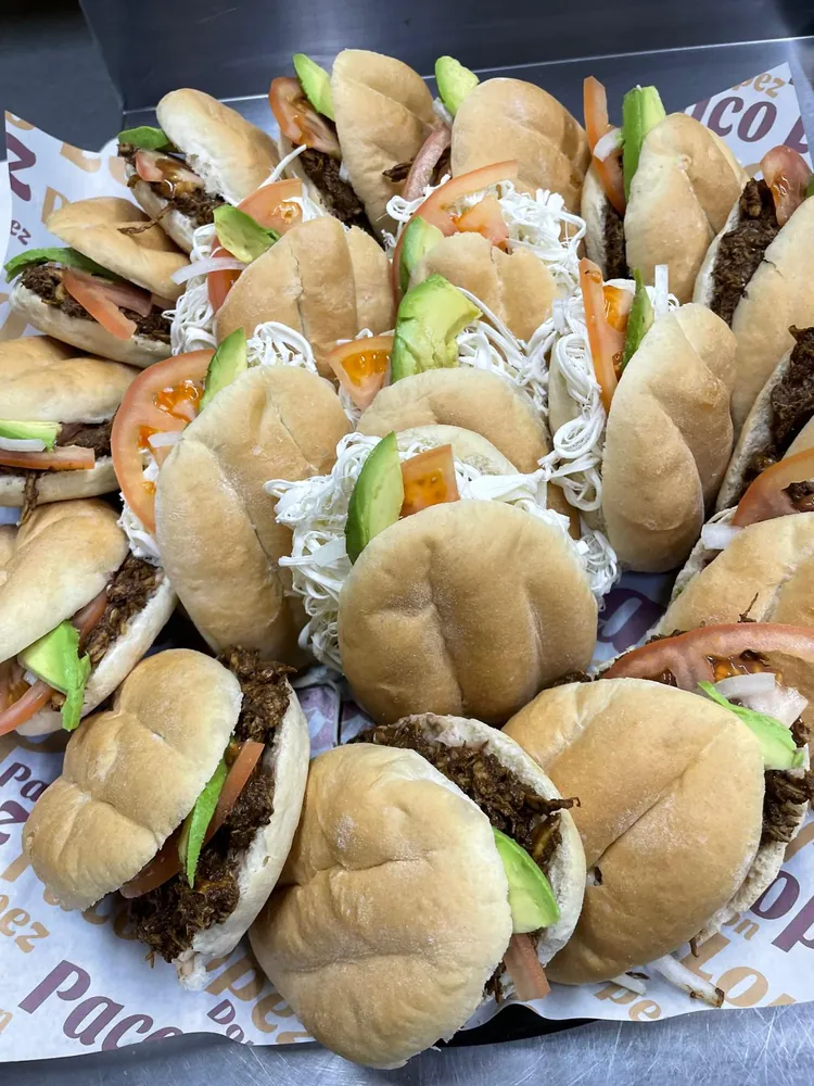 Board of mini Mexican tortas on a wooden board